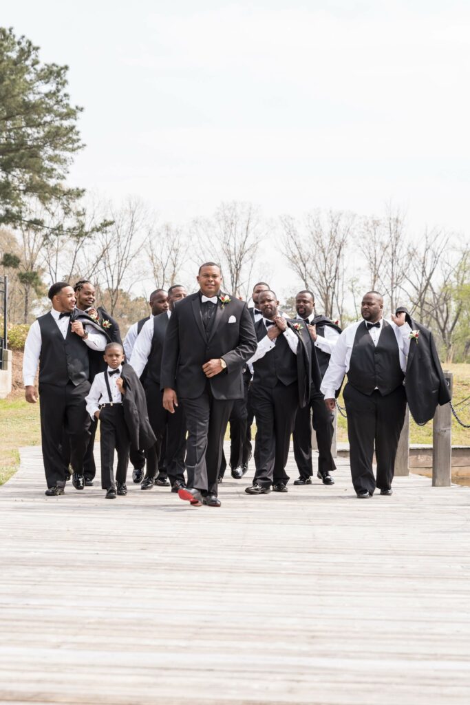 African wedding planner crafting a magical outdoor wedding ceremony