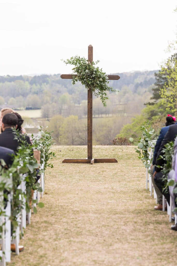 Wooden Cross Backdrop during the ceremony