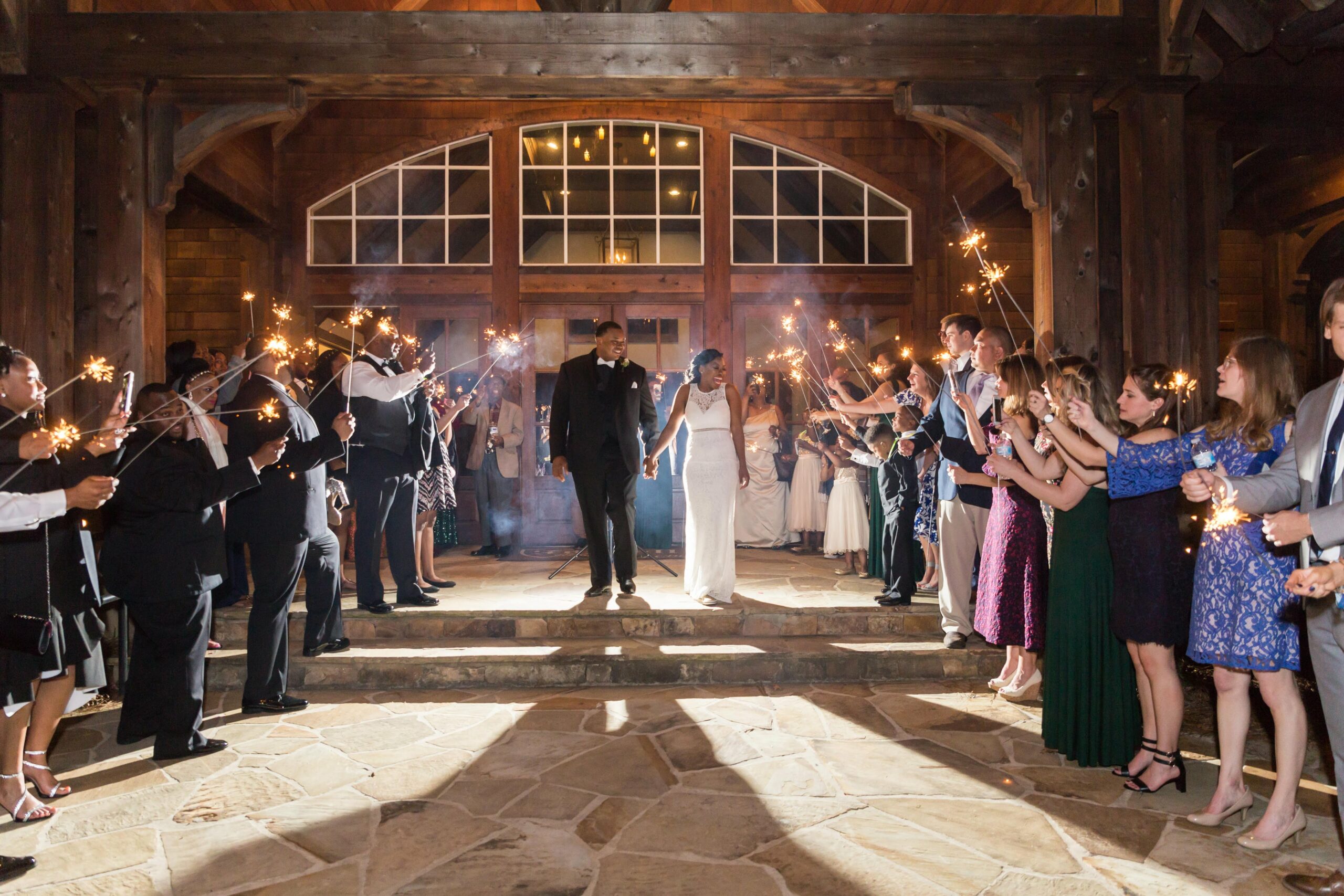 Bride and Groom Grand Send off with a line of sparklers 