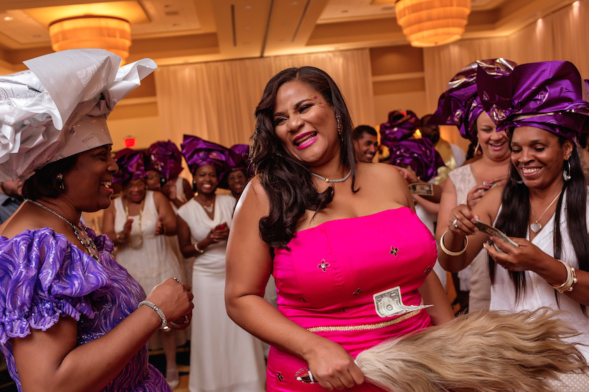 Bride With Wedding Guests Celebrating Reception