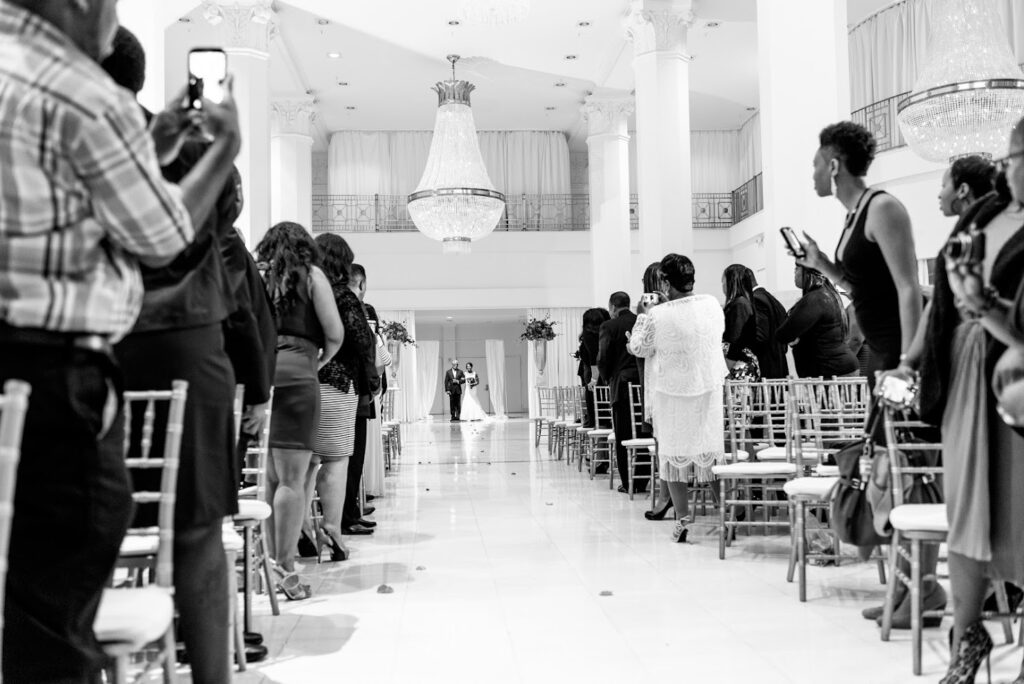Wedding Ceremony Bride Walking Down Aisle of Guests