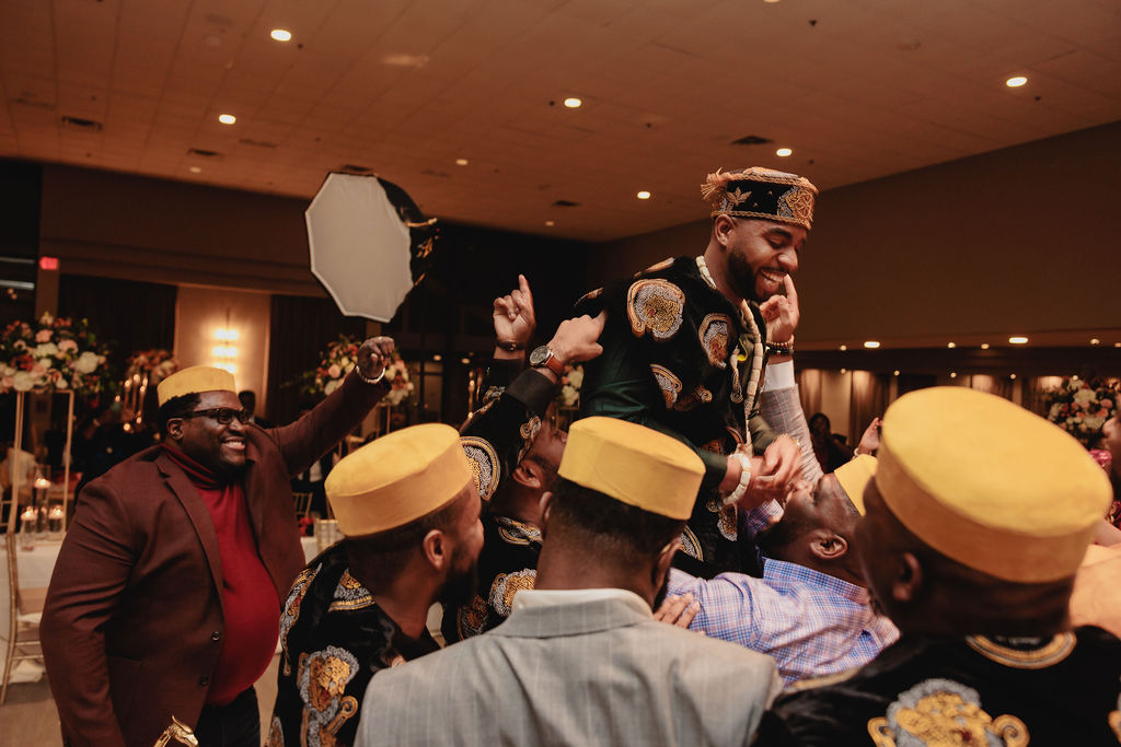 Wedding Reception Groom Carried by Guests