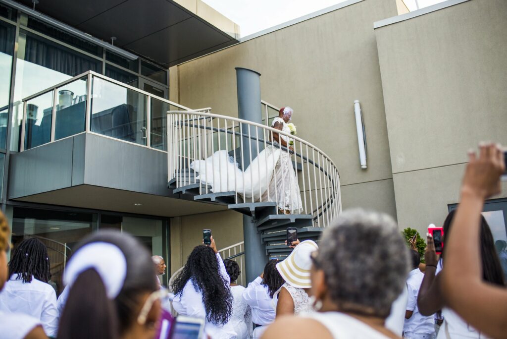 Bride Coming Down Stairs in Wedding Dress Wedding Ceremony