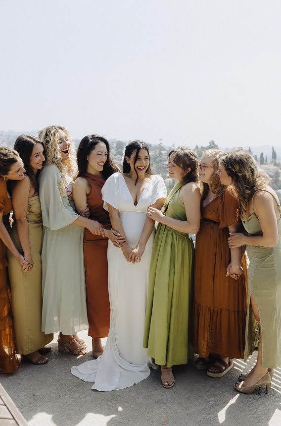 Candid Bride with Bridesmaids How to Pick The Best Wedding Day