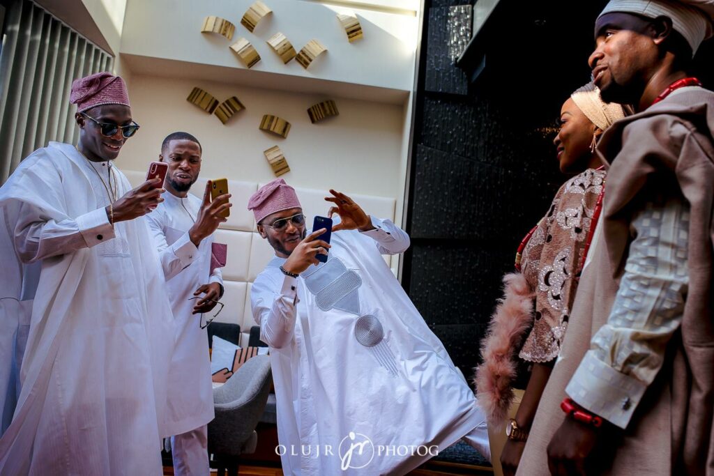 Groomsmen Hypes Groom with Money Spraying Nigerian Wedding Day